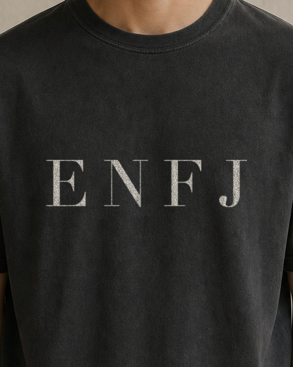 The Typese ENFJ Comfort Colors Tee in black, male front detail