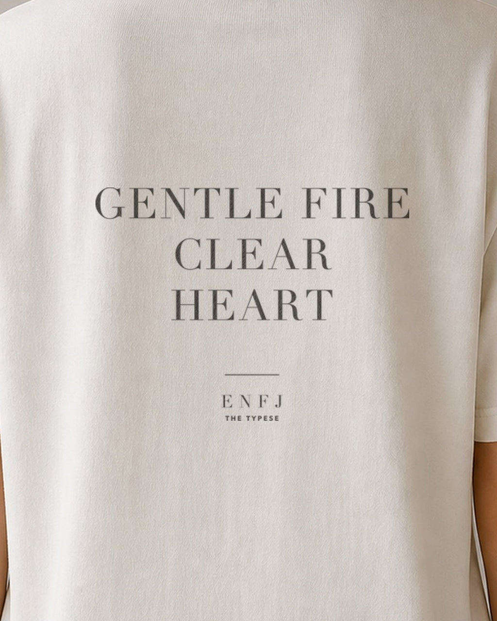 The Typese ENFJ Comfort Colors Tee in cream white, female back detail