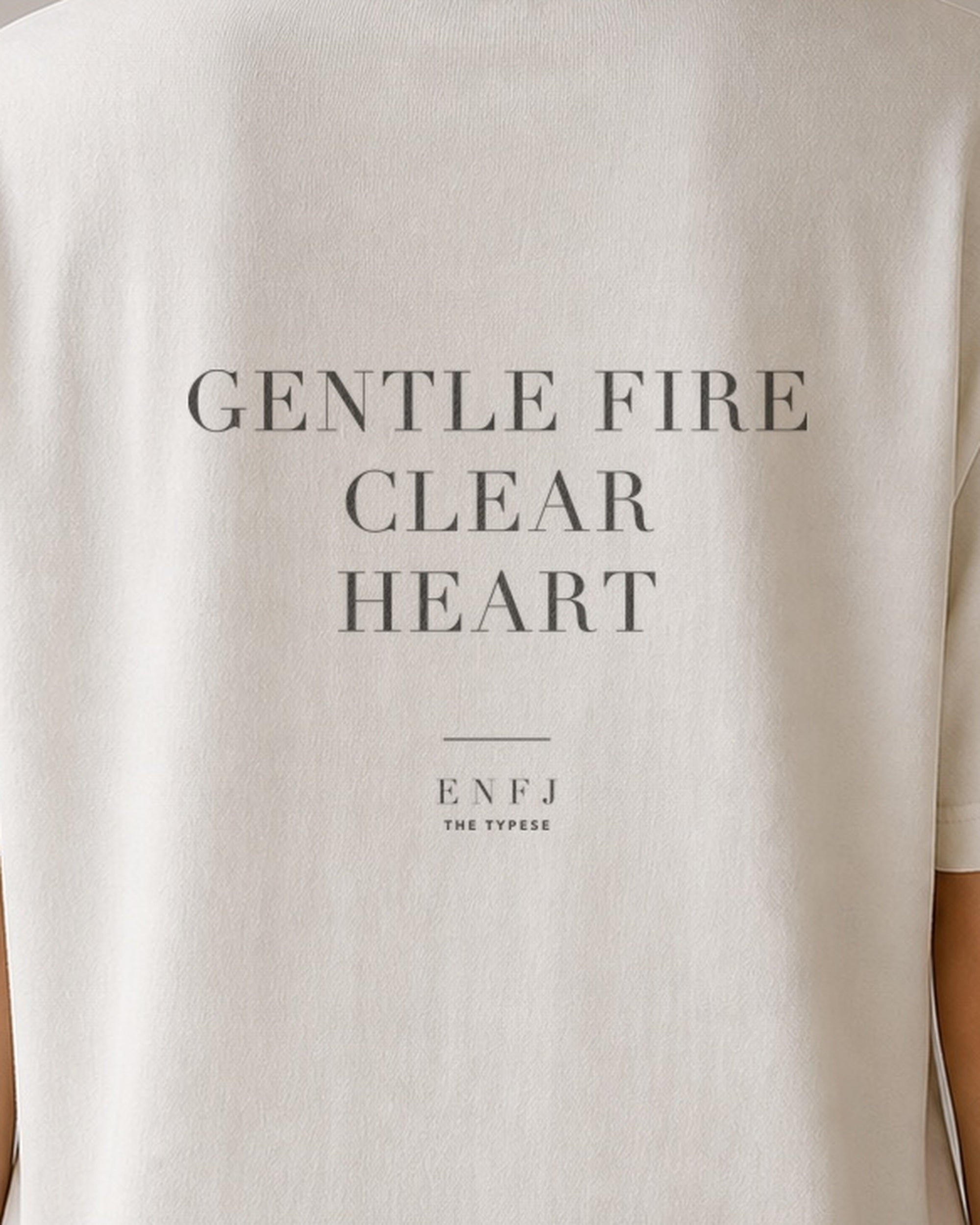 The Typese ENFJ Comfort Colors Tee in cream white, female back detail