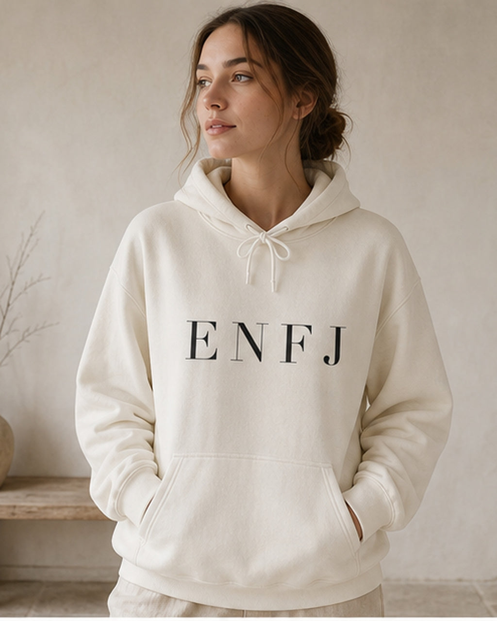 The Typese ENFJ Gildan hoodie in white, female front