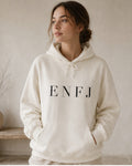 The Typese ENFJ Gildan hoodie in white, female front