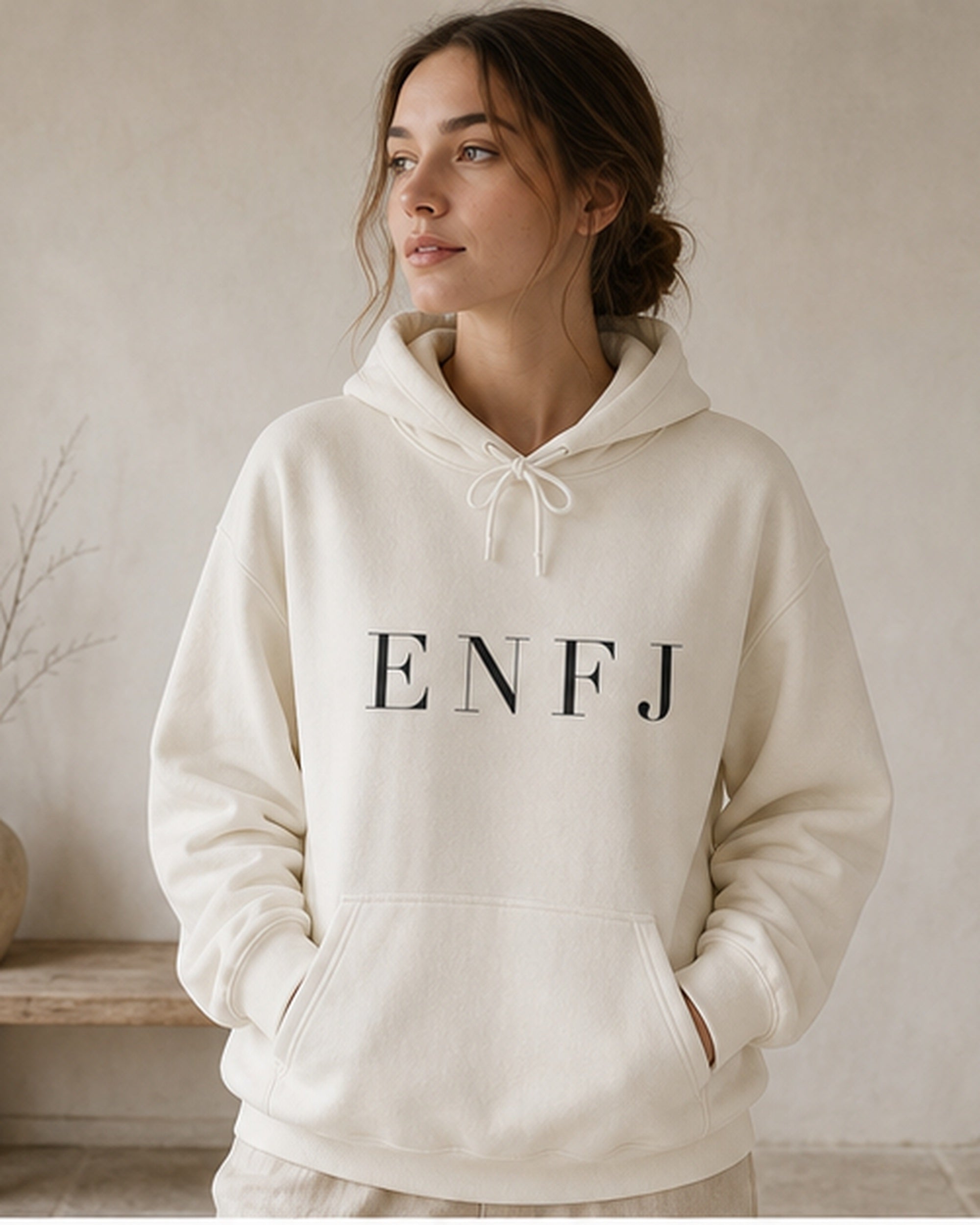 The Typese ENFJ Gildan hoodie in white, female front