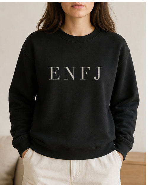 The Typese ENFJ Gildan crewneck sweatshirt in black, female front