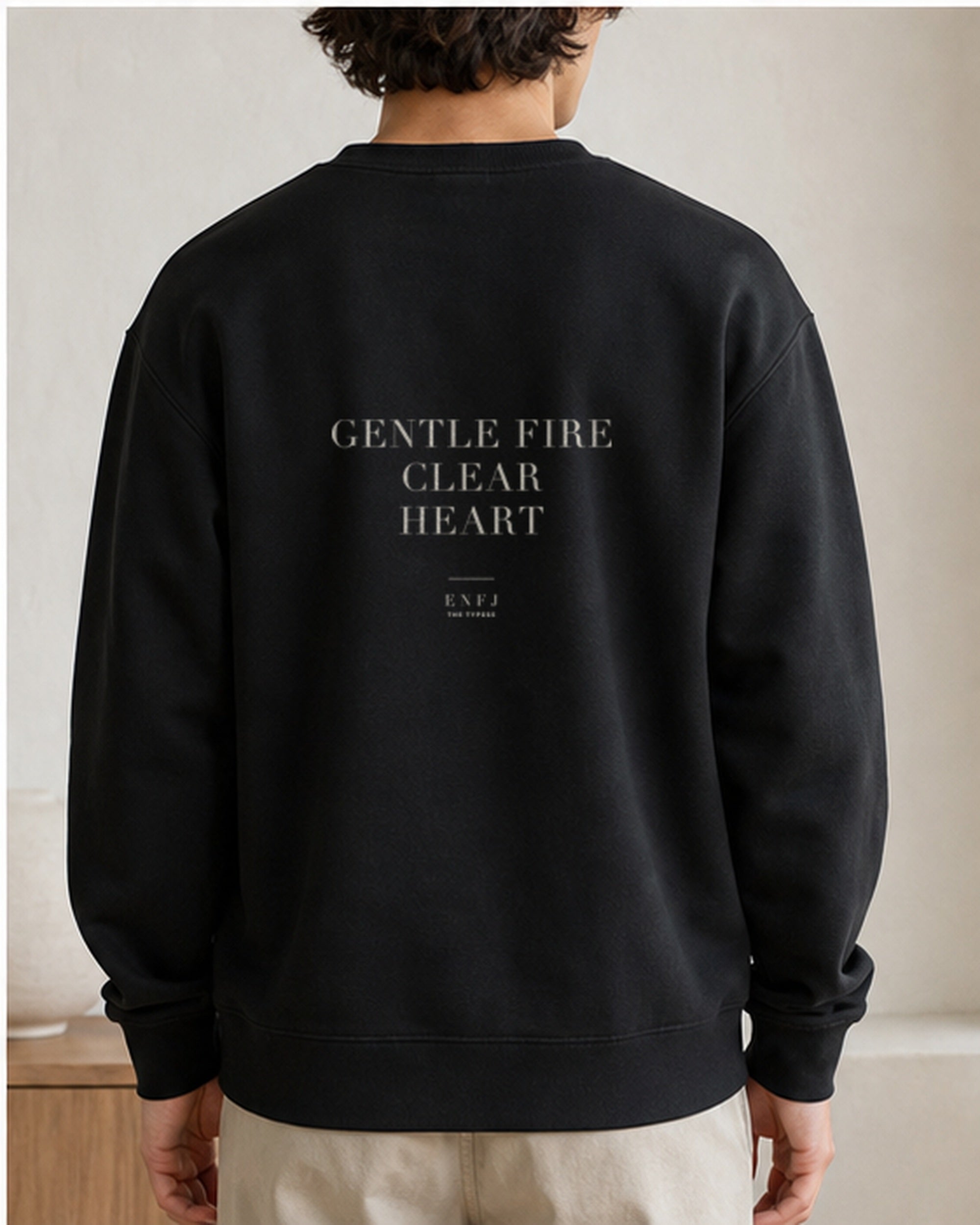 The Typese ENFJ Gildan crewneck sweatshirt in black, male back