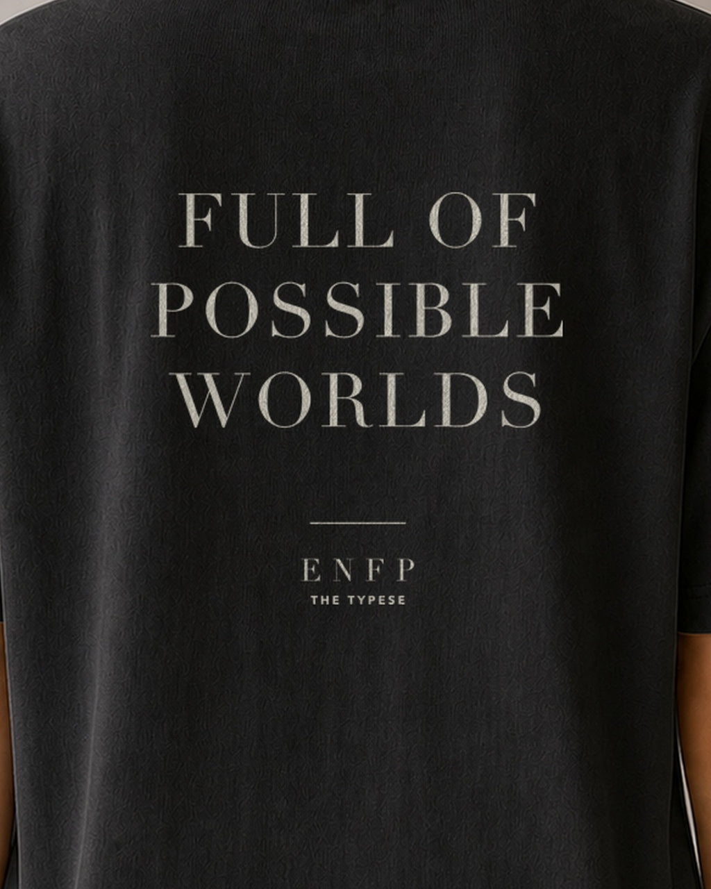 The Typese ENFP Comfort Colors Tee in black, female back detail