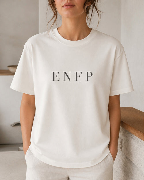 The Typese ENFP Comfort Colors Tee in cream white, female front