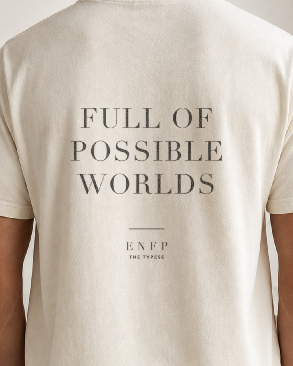 The Typese ENFP Comfort Colors Tee in cream white, male back detail