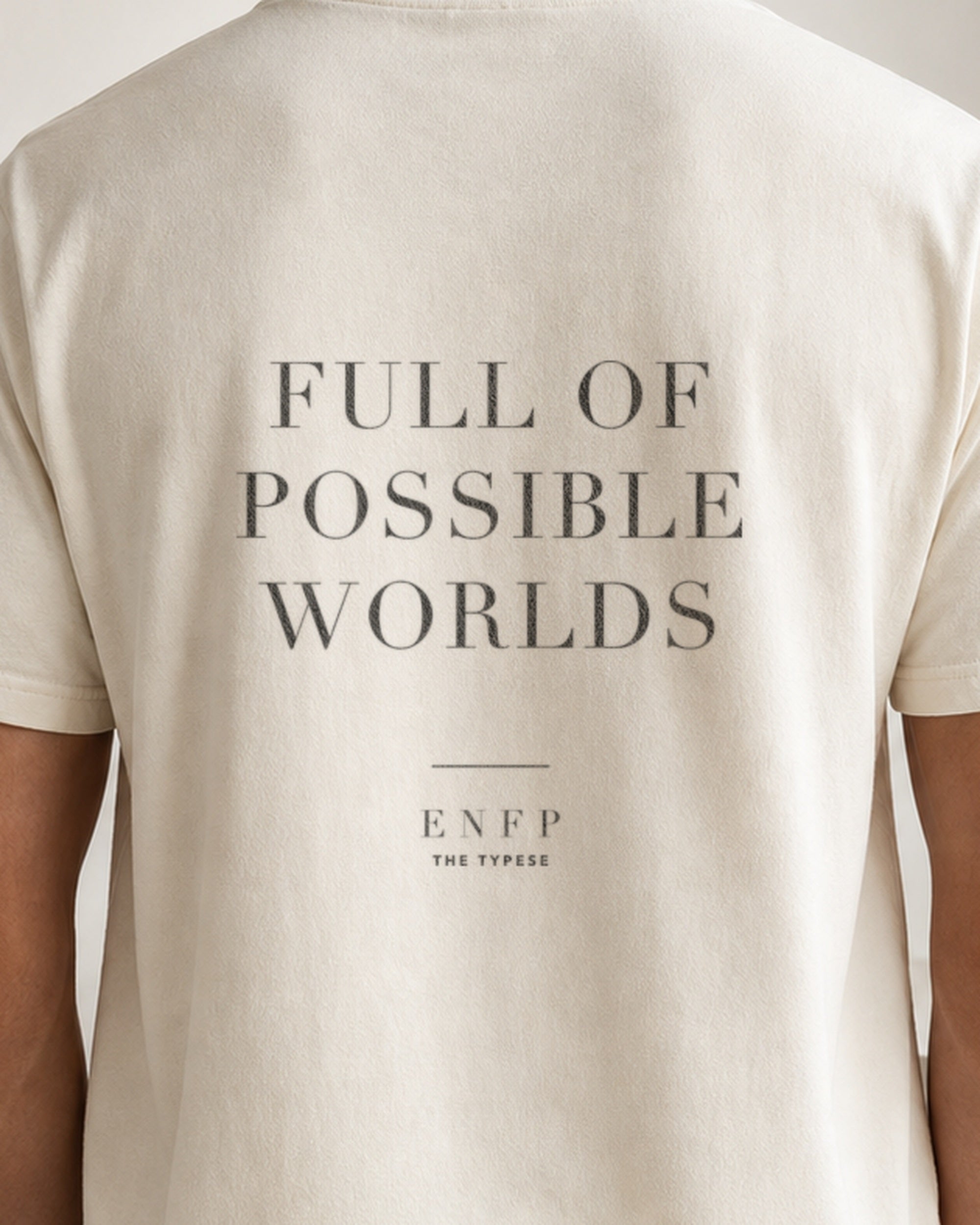 The Typese ENFP Comfort Colors Tee in cream white, male back detail