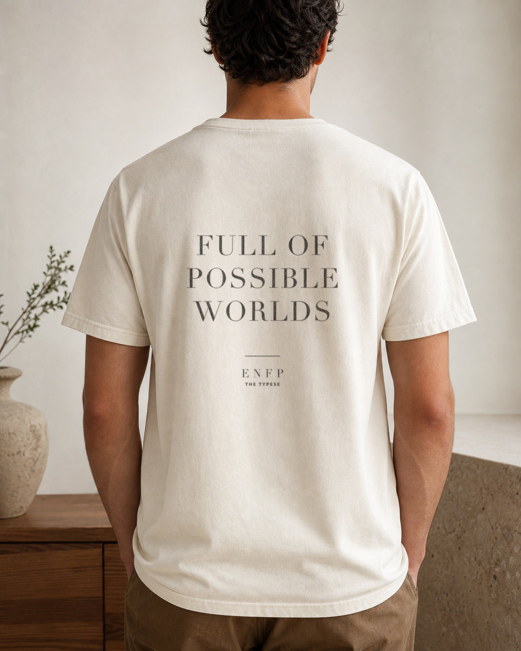 The Typese ENFP Comfort Colors Tee in cream white, male back