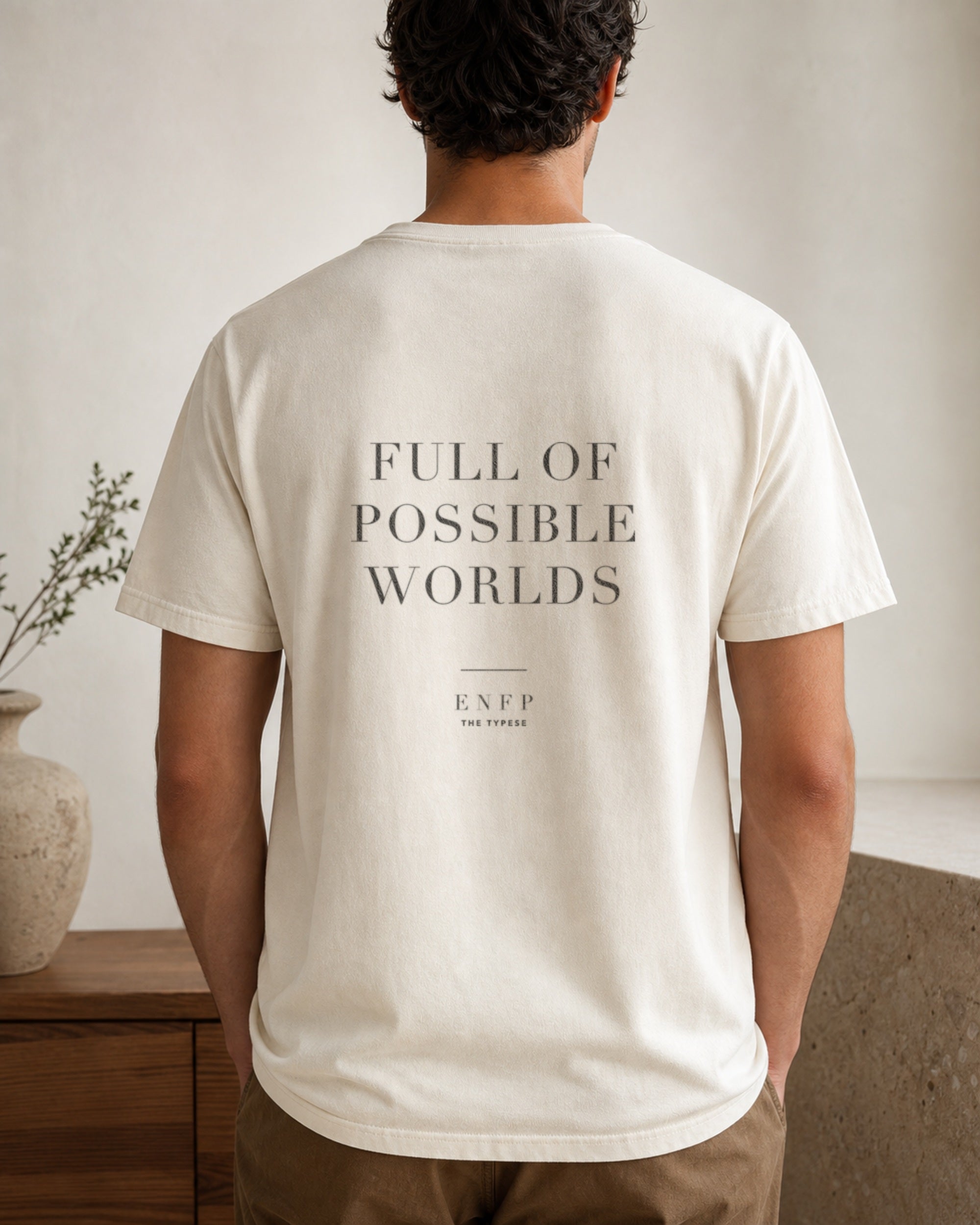 The Typese ENFP Comfort Colors Tee in cream white, male back
