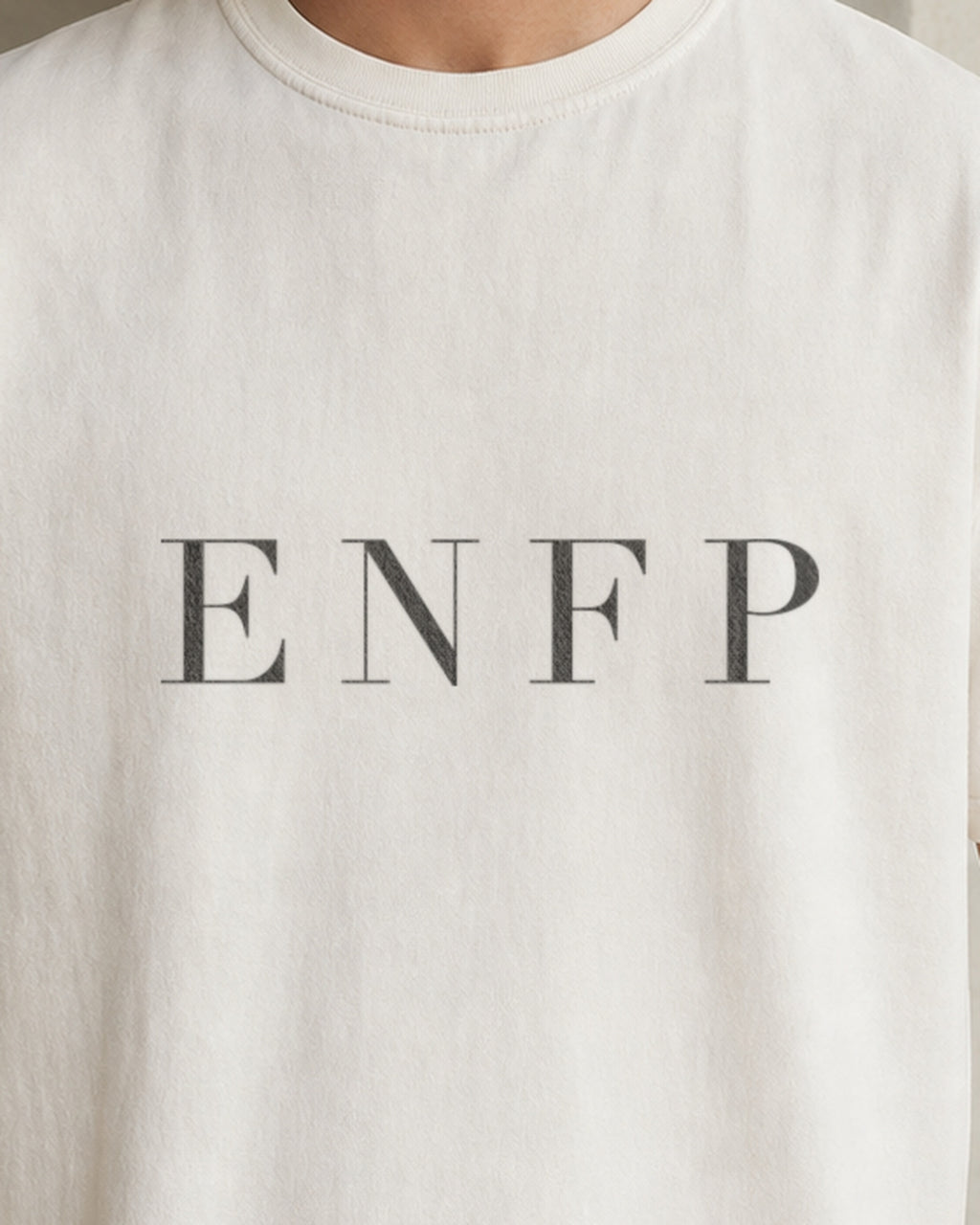 The Typese ENFP Comfort Colors Tee in cream white, male front detail