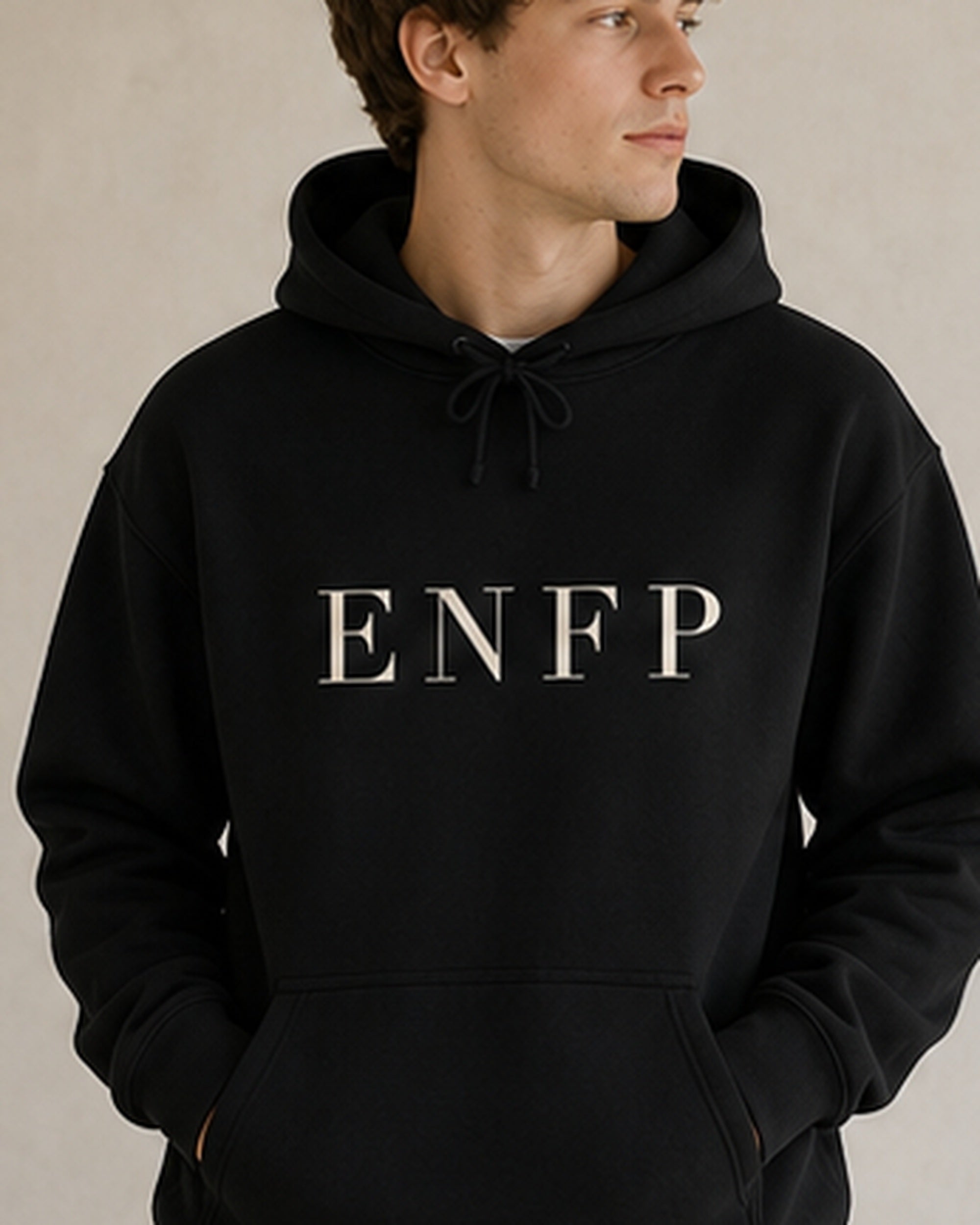 The Typese ENFP Gildan hoodie in black, male front detail