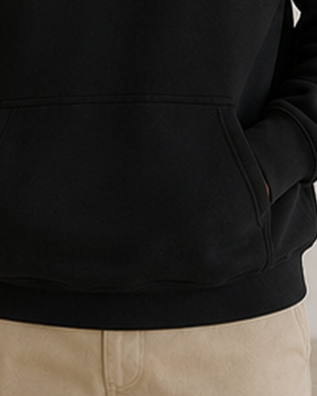 The Typese ENFP Gildan hoodie in black, hem pocket detail