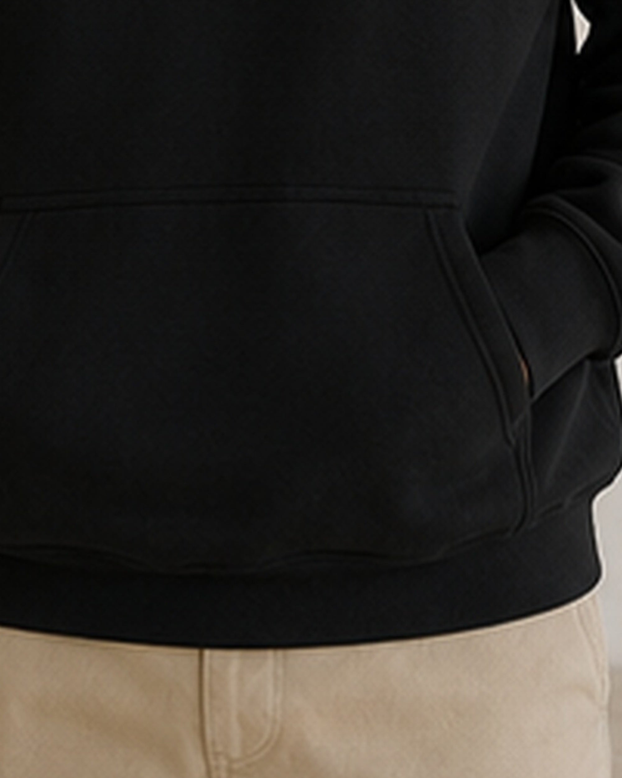 The Typese ENFP Gildan hoodie in black, hem pocket detail