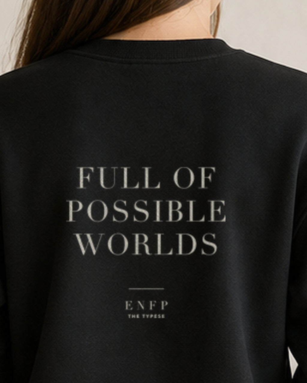 The Typese ENFP Gildan crewneck sweatshirt in black, female back neckline print