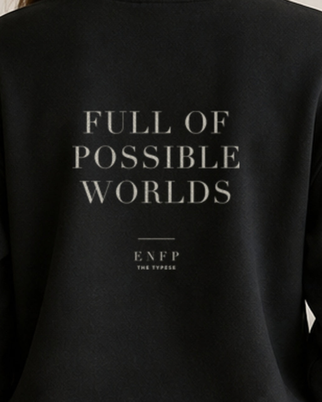 The Typese ENFP Gildan crewneck sweatshirt in black, female back print close