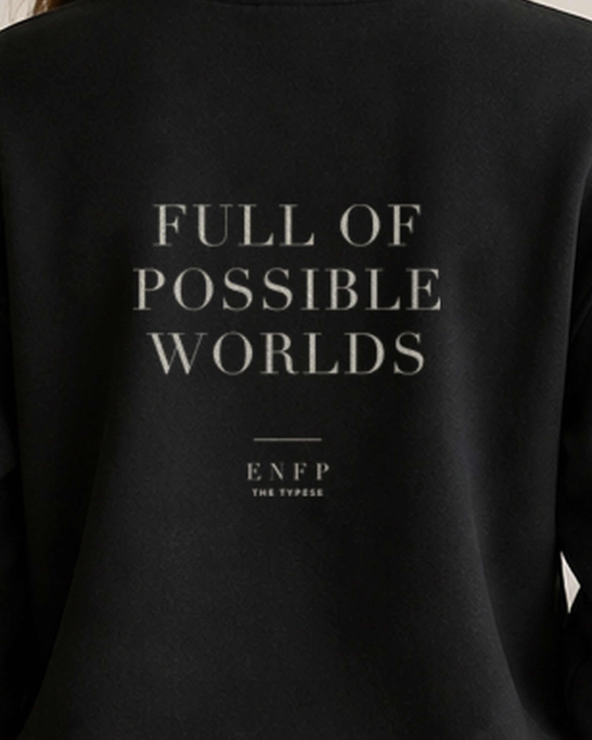 The Typese ENFP Gildan crewneck sweatshirt in black, female back print close
