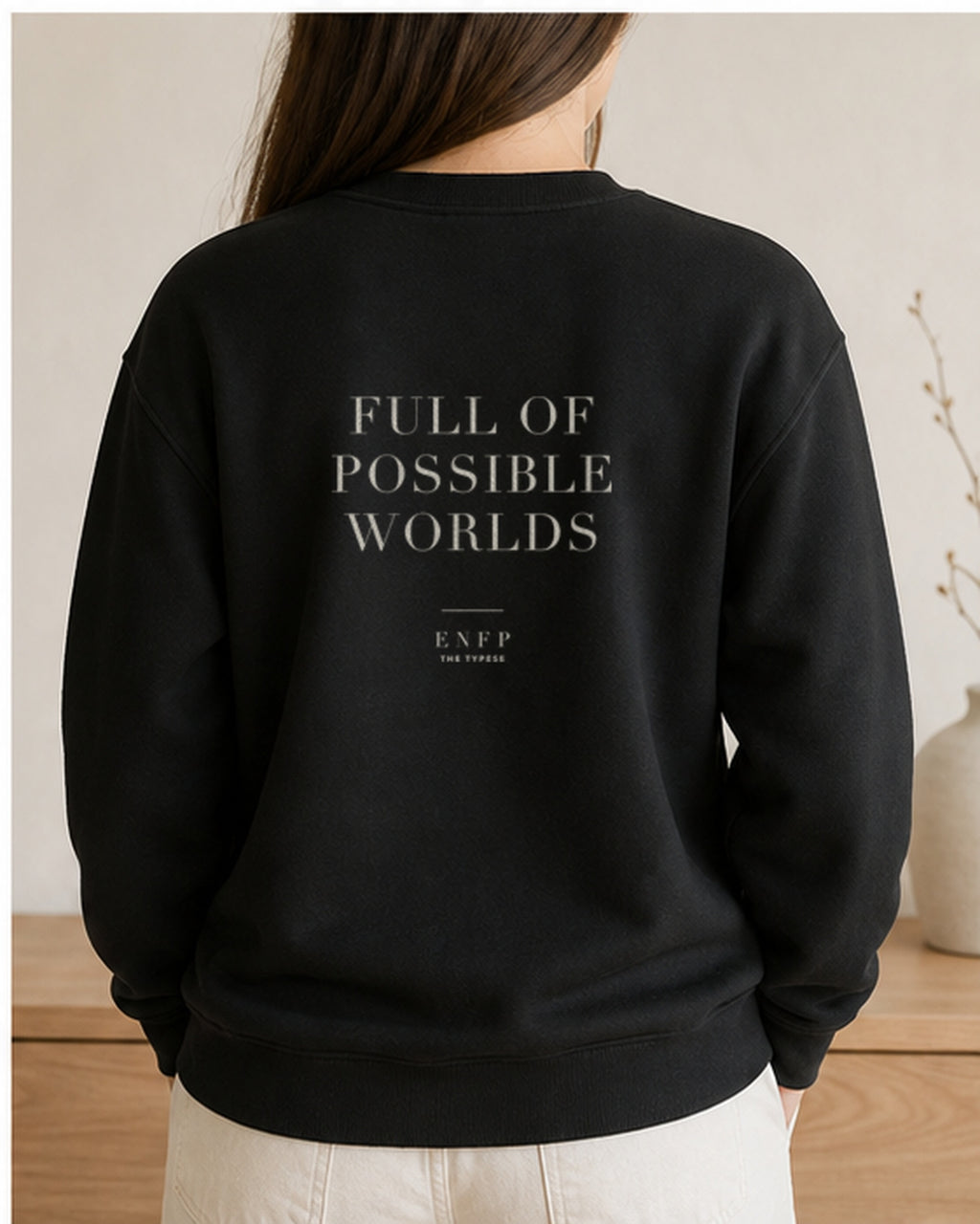 The Typese ENFP Gildan crewneck sweatshirt in black, female back