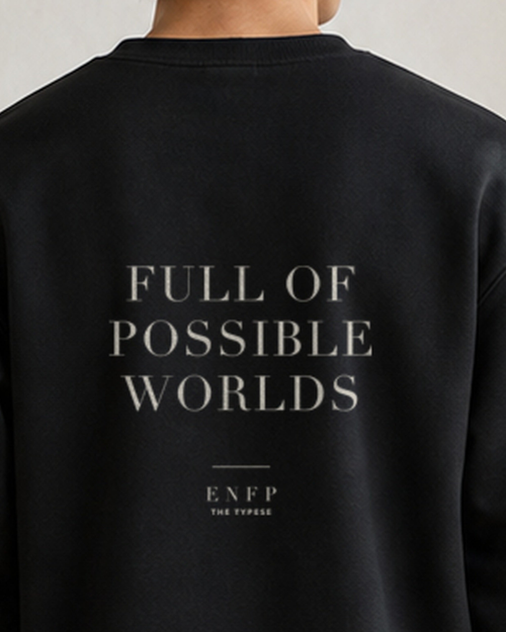 The Typese ENFP Gildan crewneck sweatshirt in black, male back neckline print