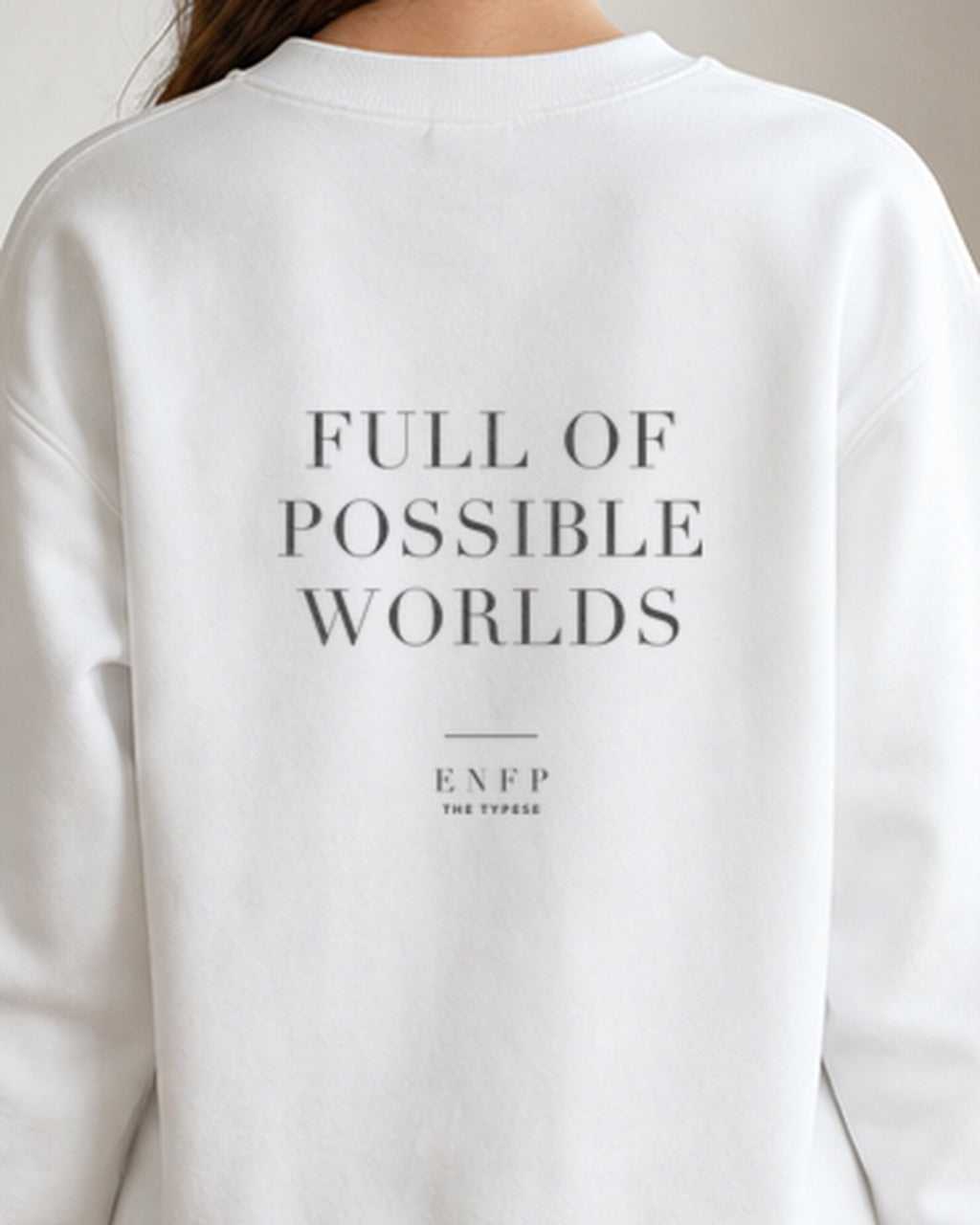 The Typese ENFP Gildan crewneck sweatshirt in white, female back detail
