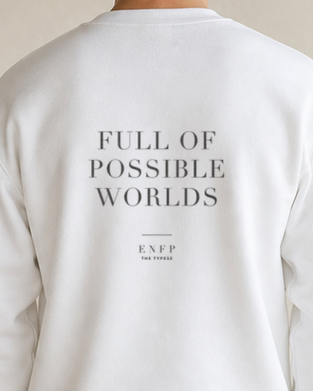 The Typese ENFP Gildan crewneck sweatshirt in white, male back detail