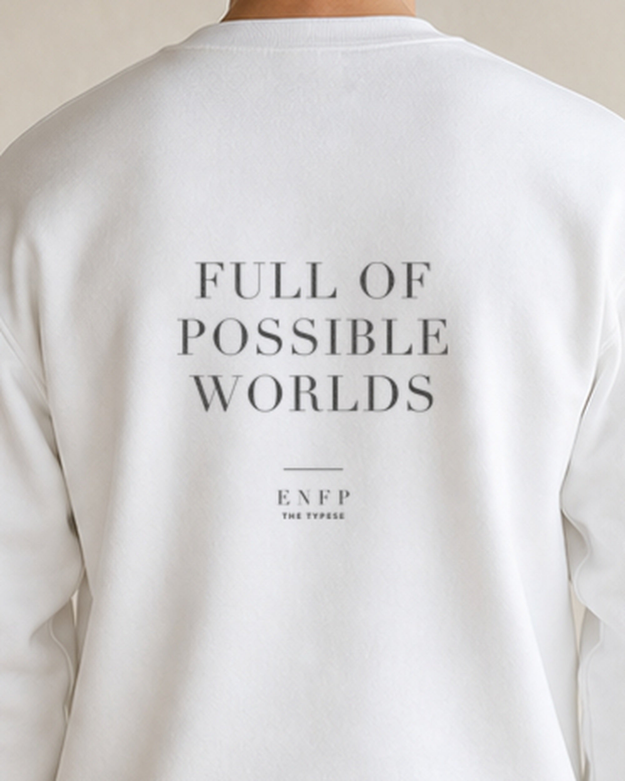 The Typese ENFP Gildan crewneck sweatshirt in white, male back detail