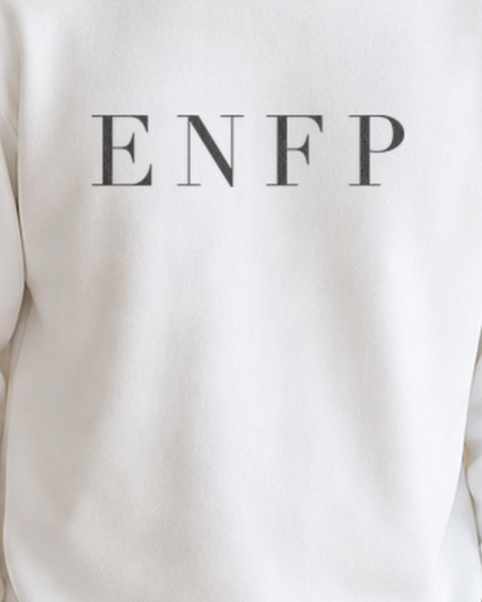 The Typese ENFP Gildan crewneck sweatshirt in white, male front print close