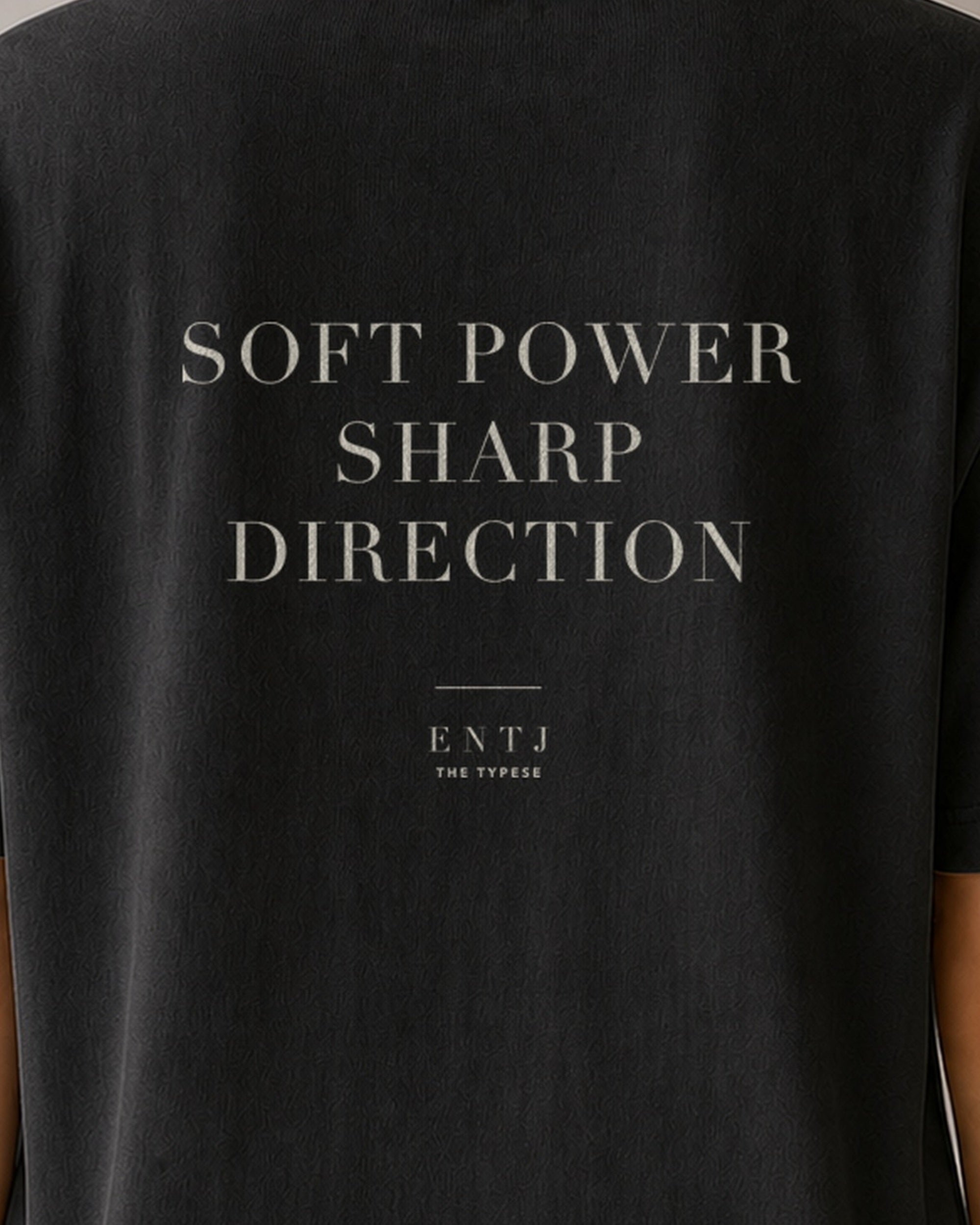 The Typese ENTJ Comfort Colors Tee in black, female back detail