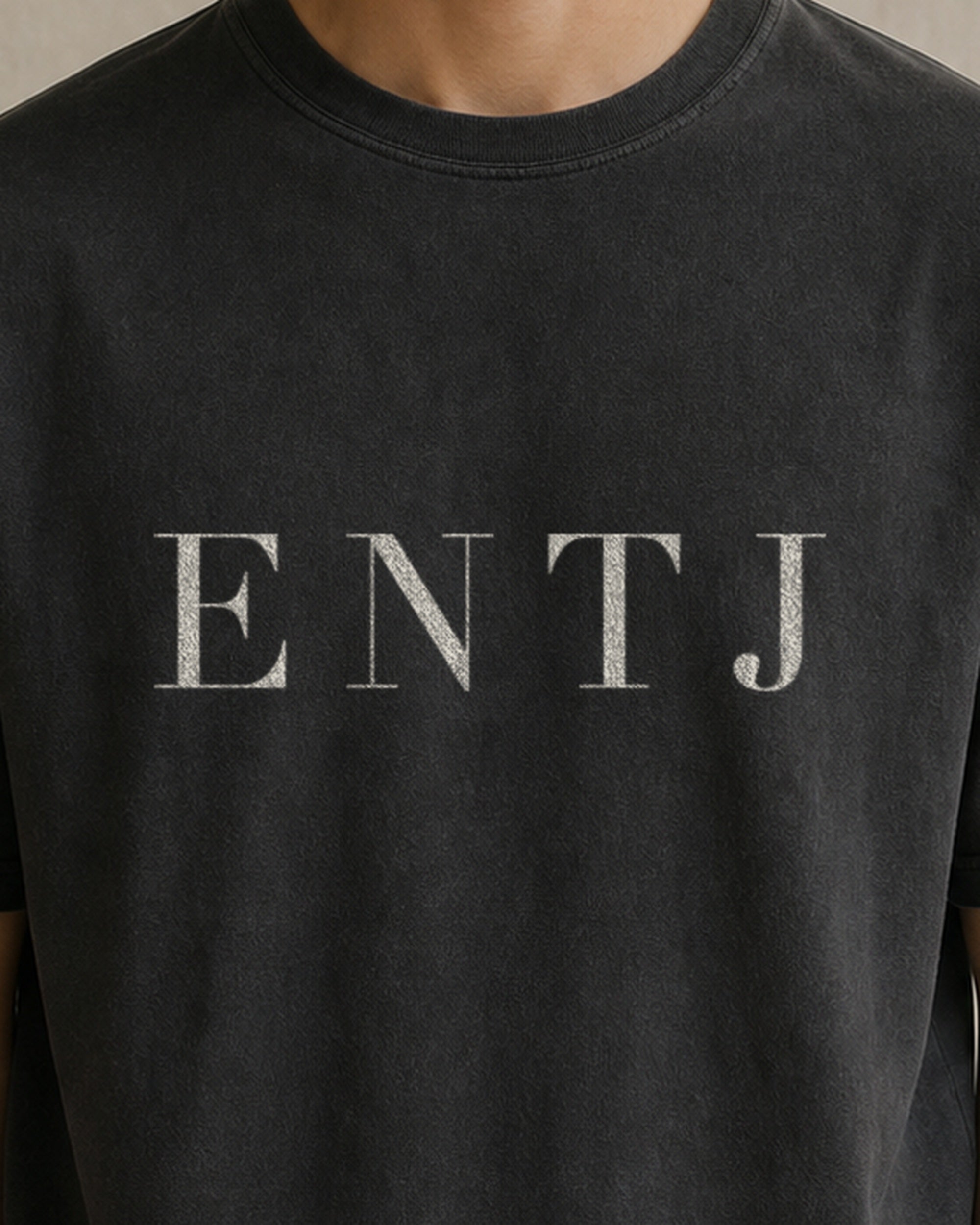 The Typese ENTJ Comfort Colors Tee in black, male front detail
