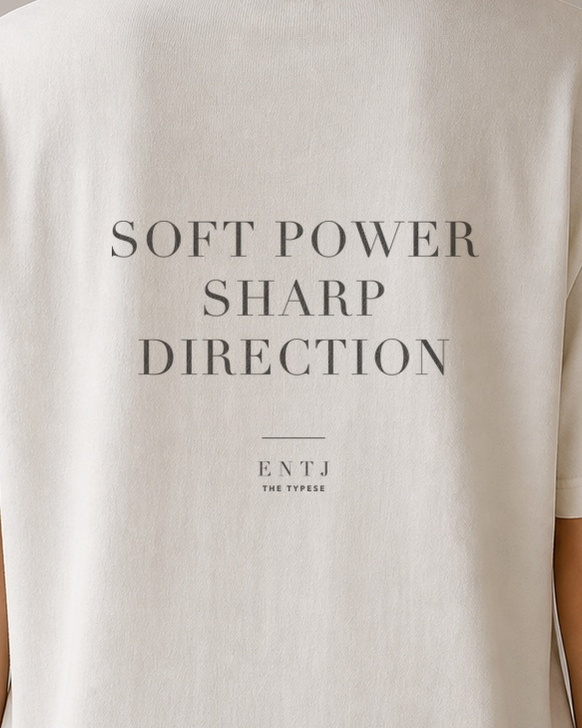 The Typese ENTJ Comfort Colors Tee in cream white, female back detail