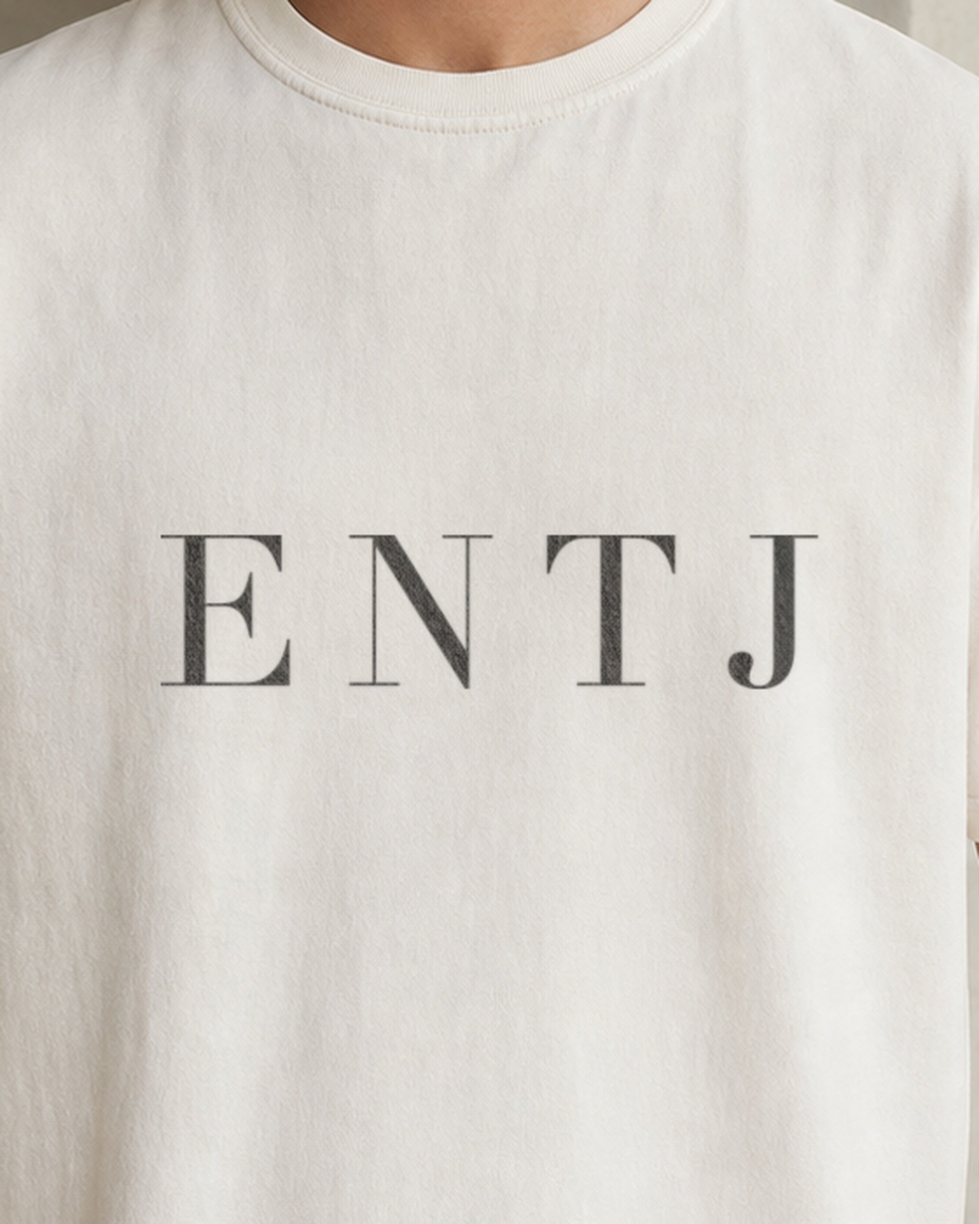 The Typese ENTJ Comfort Colors Tee in cream white, male front detail