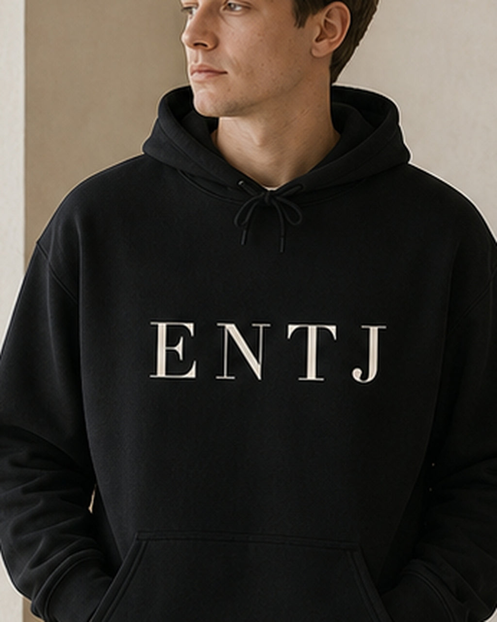 The Typese ENTJ Gildan hoodie in black, male front detail
