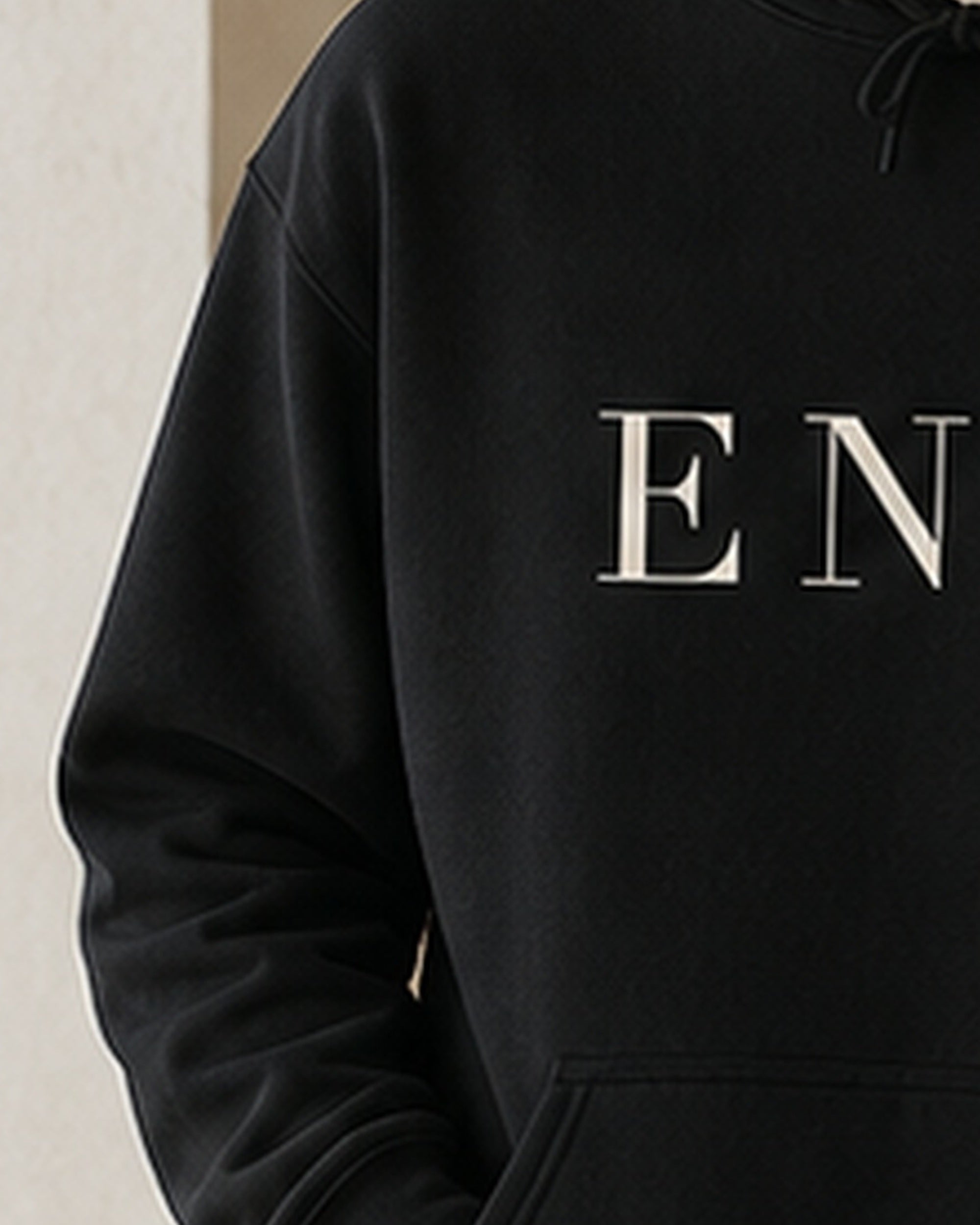 The Typese ENTJ Gildan hoodie in black, sleeve detail