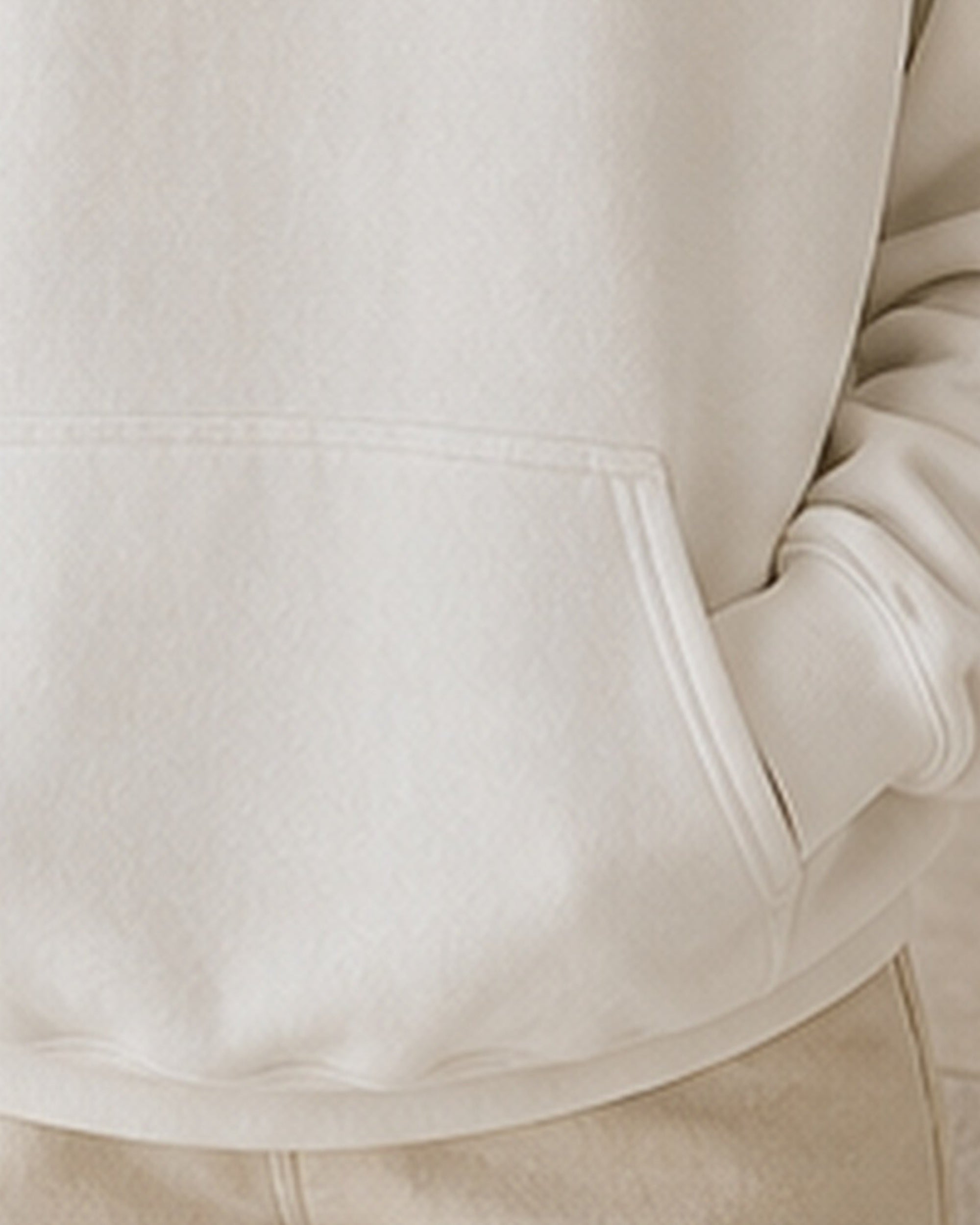 The Typese ENTJ Gildan hoodie in white, hem pocket detail