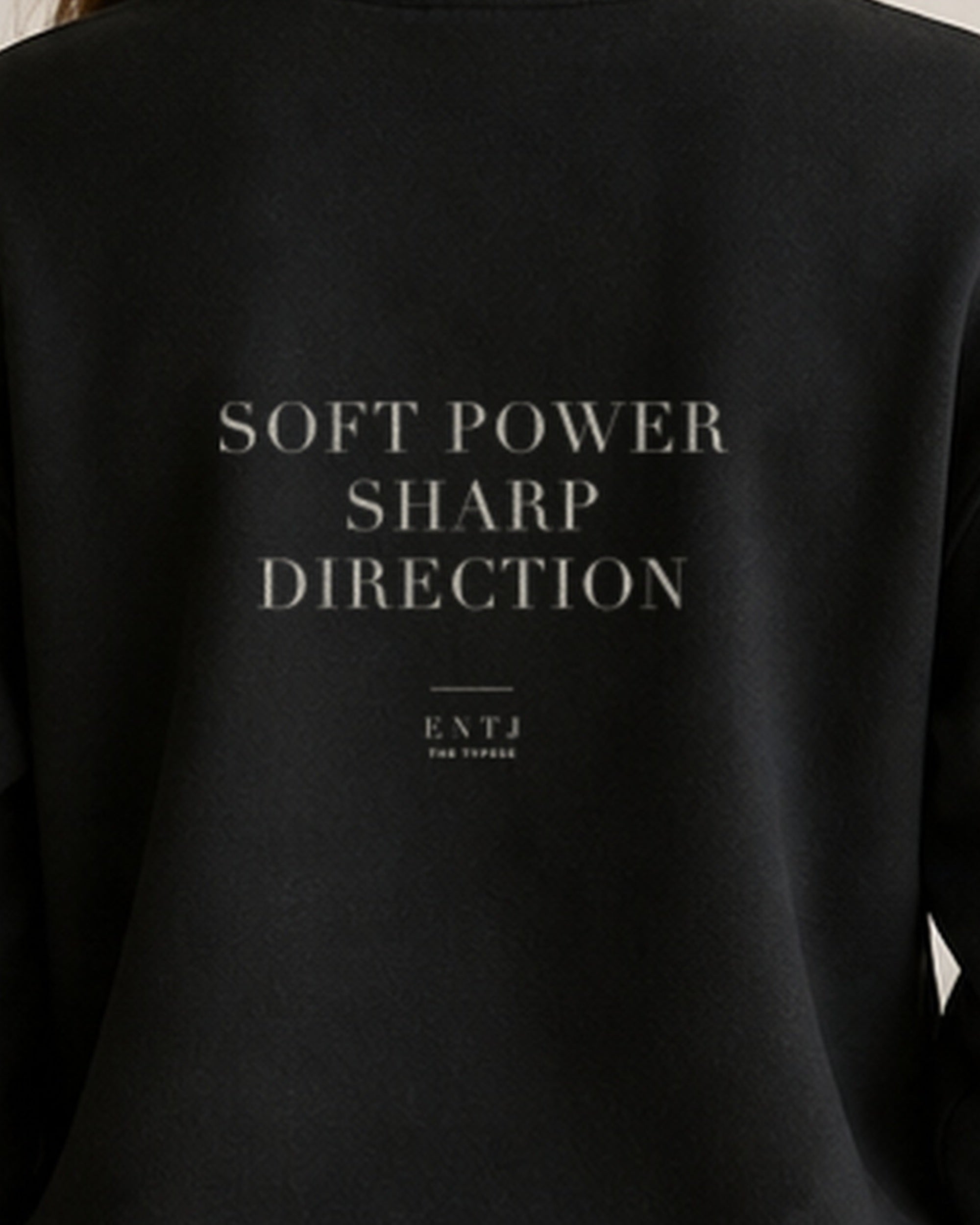 The Typese ENTJ Gildan crewneck sweatshirt in black, female back print close