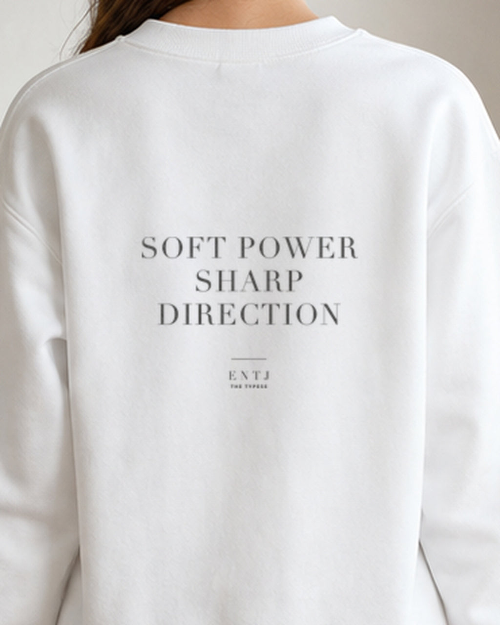 The Typese ENTJ Gildan crewneck sweatshirt in white, female back detail