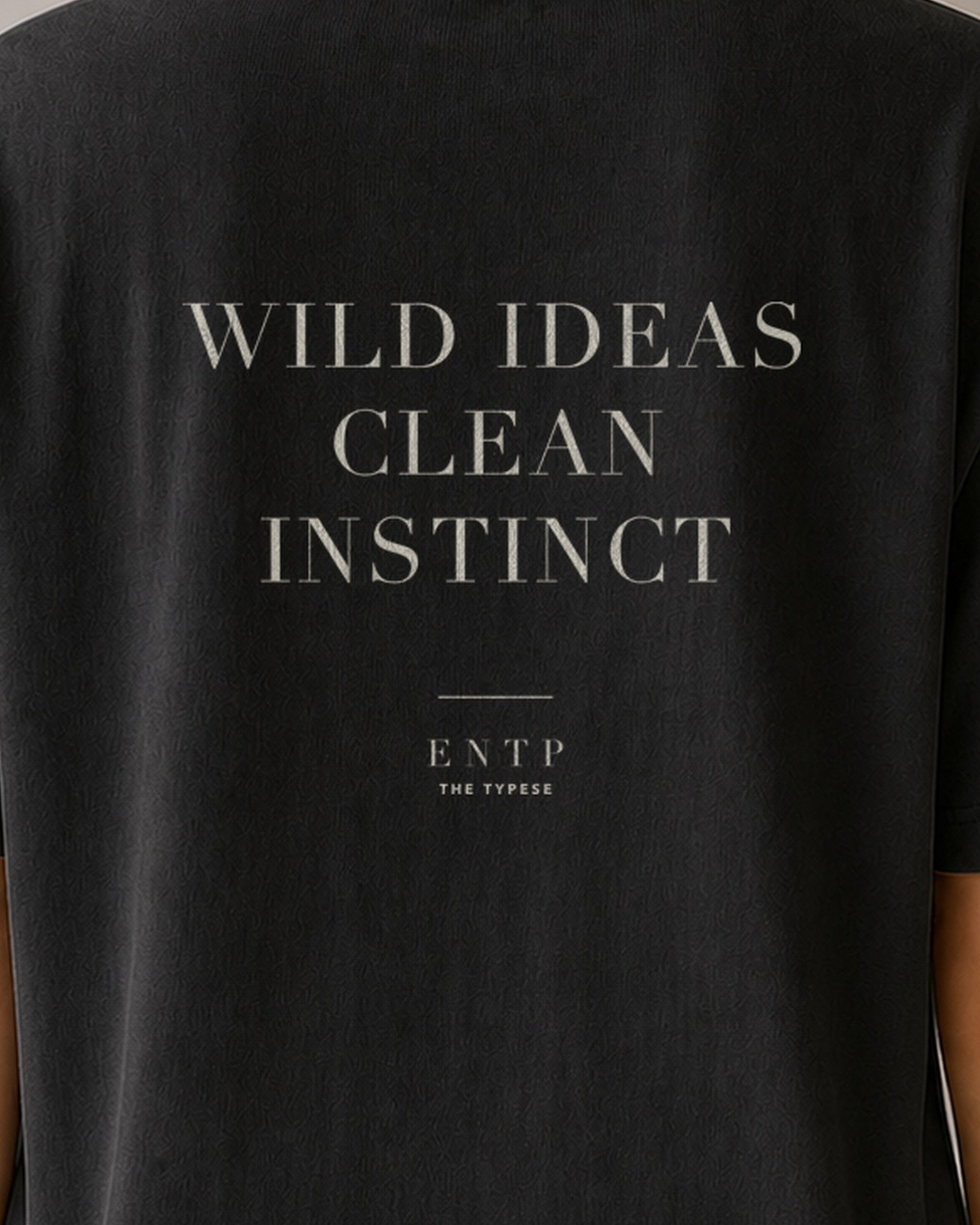 The Typese ENTP Comfort Colors Tee in black, female back detail