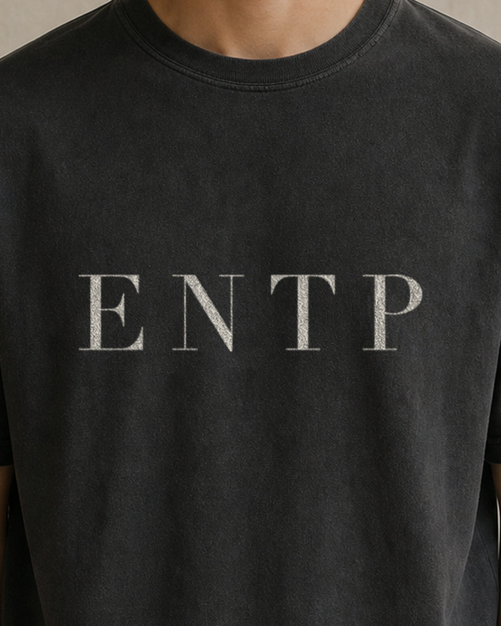 The Typese ENTP Comfort Colors Tee in black, male front detail