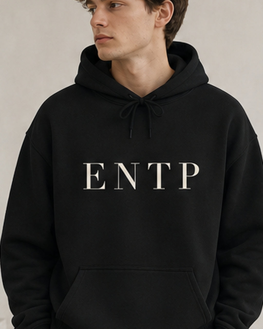 The Typese ENTP Gildan hoodie in black, male front detail