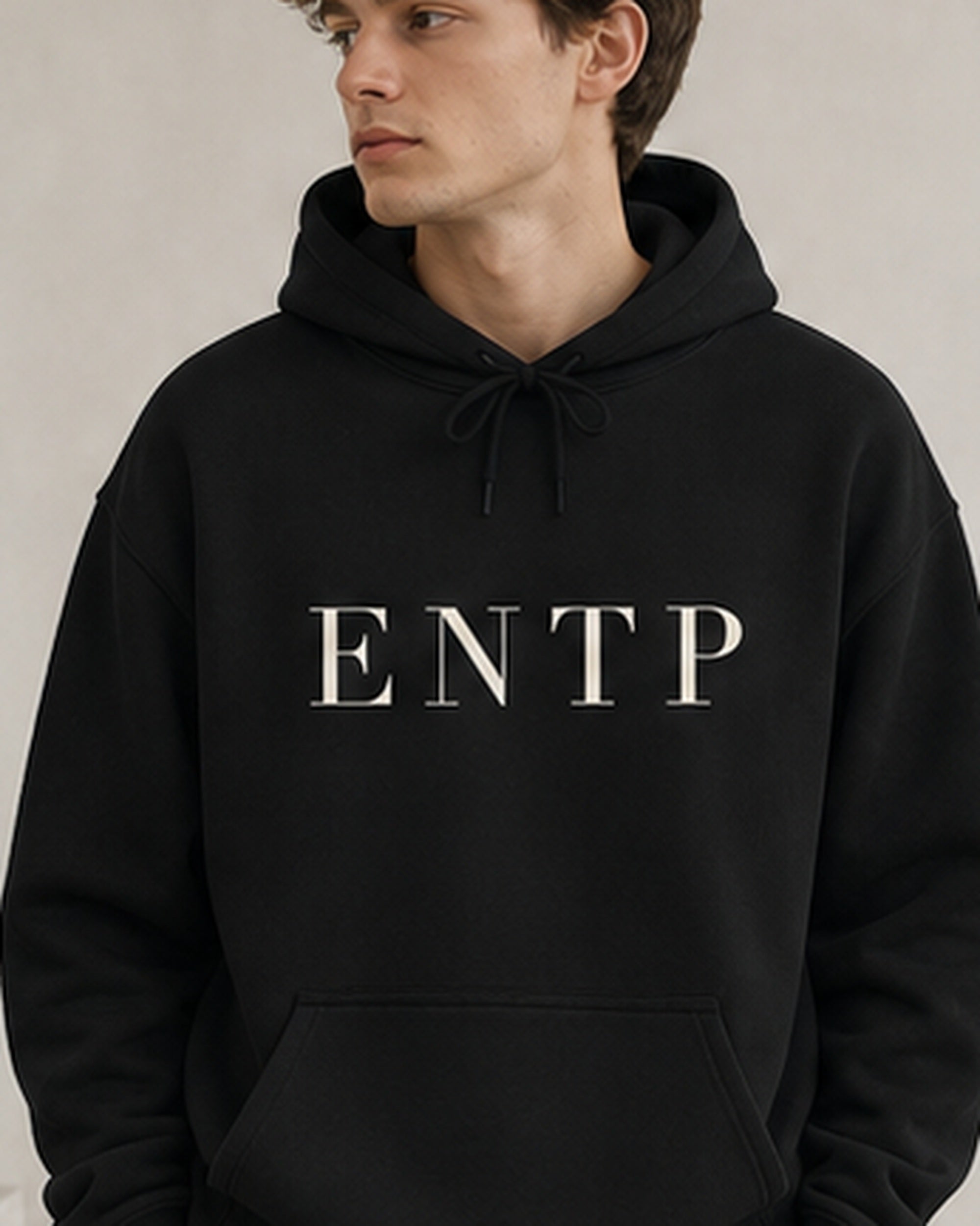 The Typese ENTP Gildan hoodie in black, male front detail