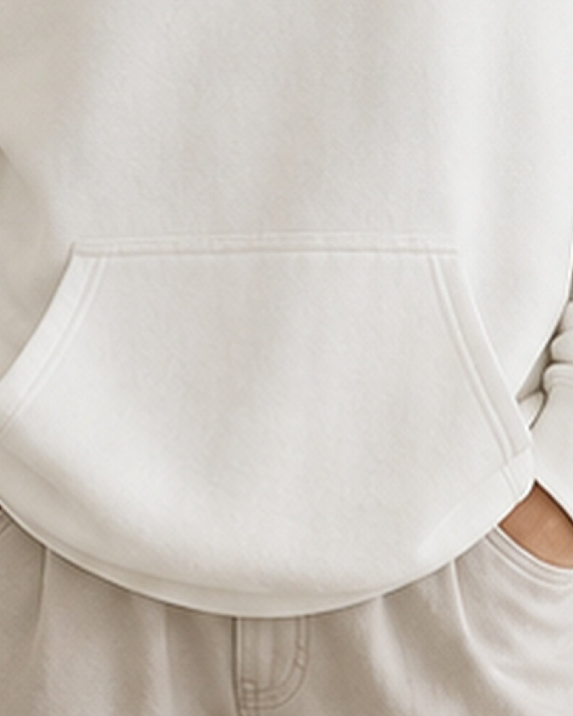 The Typese ENTP Gildan hoodie in white, hem pocket detail