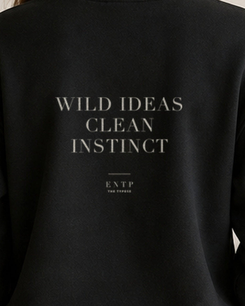 The Typese ENTP Gildan crewneck sweatshirt in black, female back print close