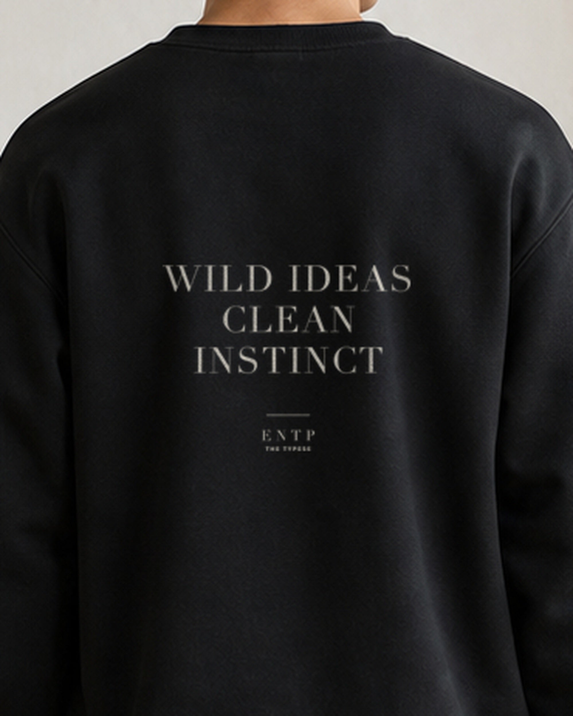 The Typese ENTP Gildan crewneck sweatshirt in black, male back detail