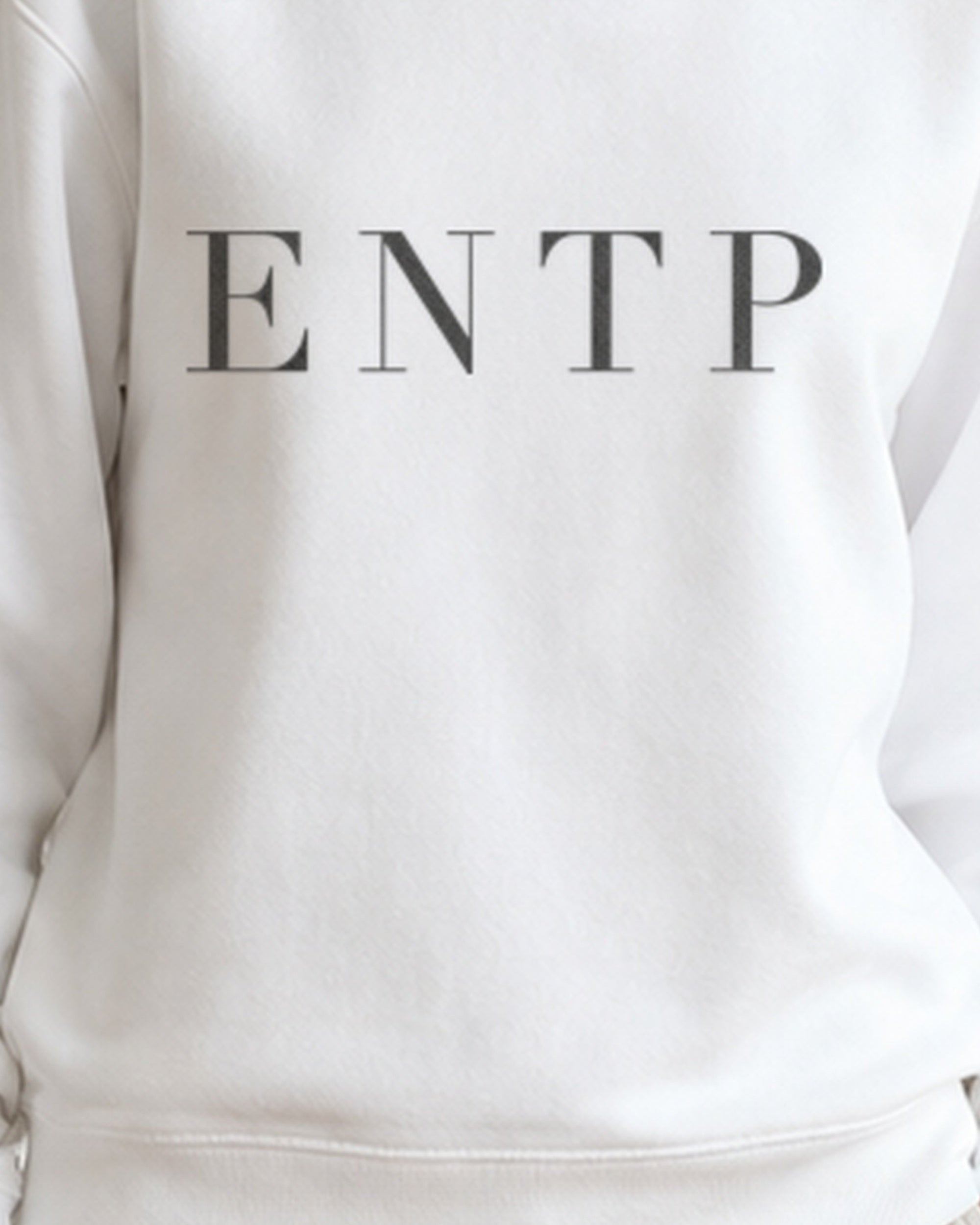 The Typese ENTP Gildan crewneck sweatshirt in white, female front print close