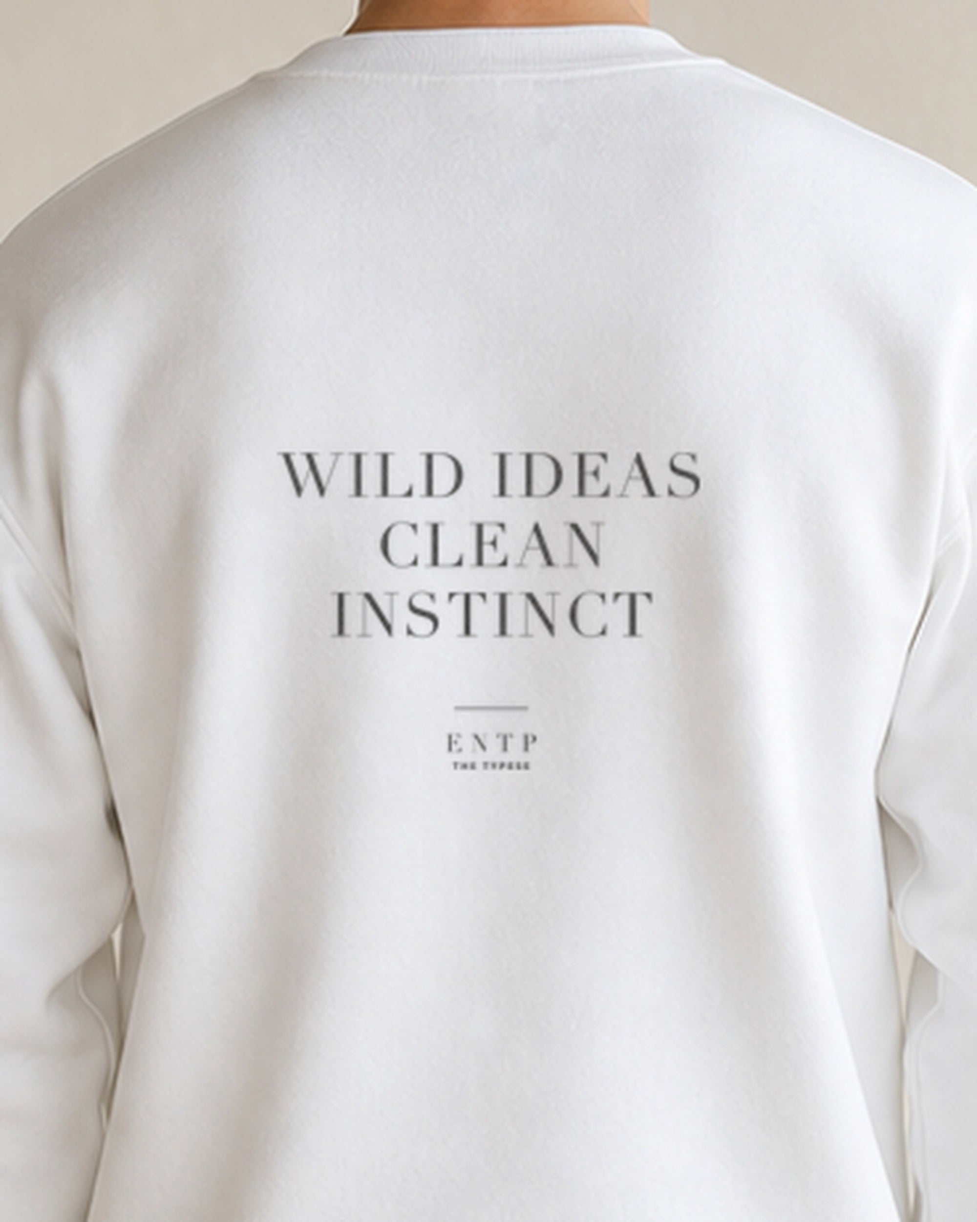The Typese ENTP Gildan crewneck sweatshirt in white, male back detail