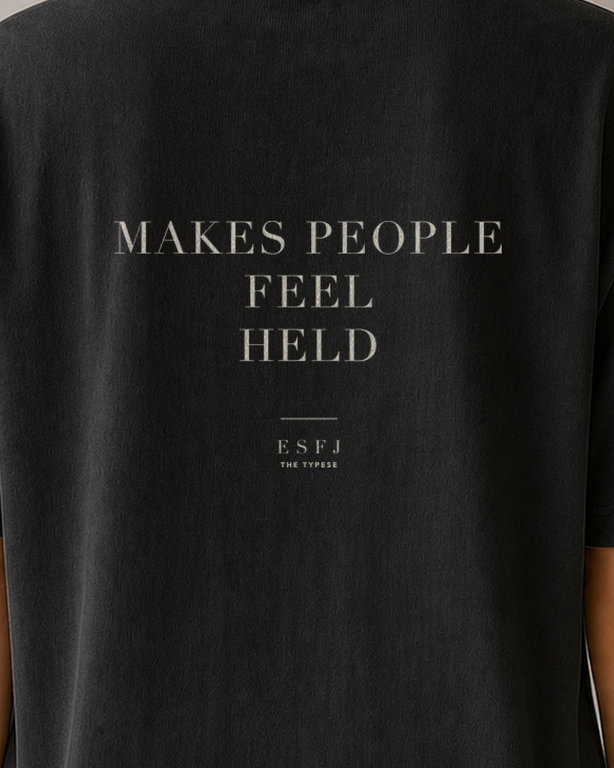 The Typese ESFJ Comfort Colors Tee in black, female back detail