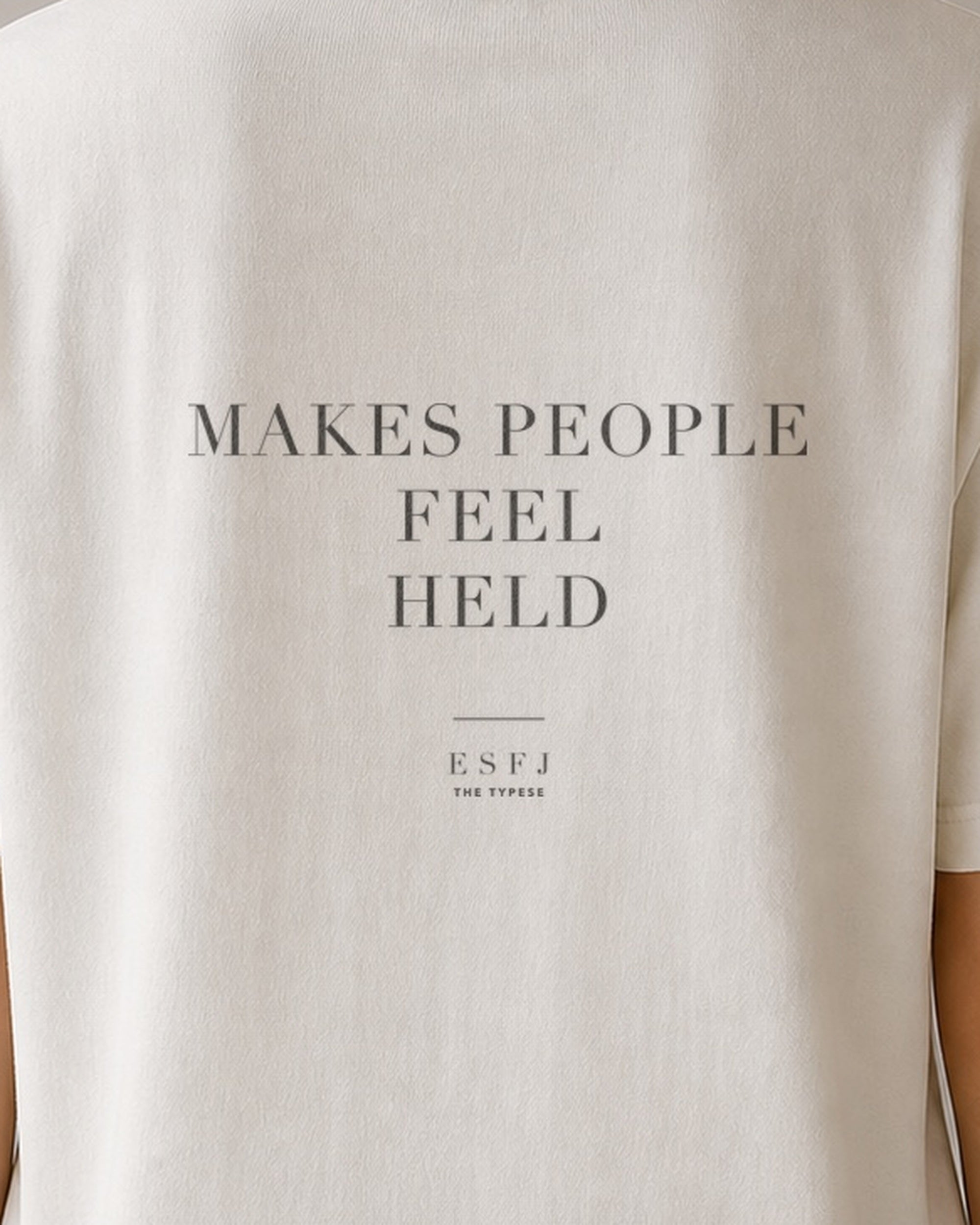 The Typese ESFJ Comfort Colors Tee in cream white, female back detail