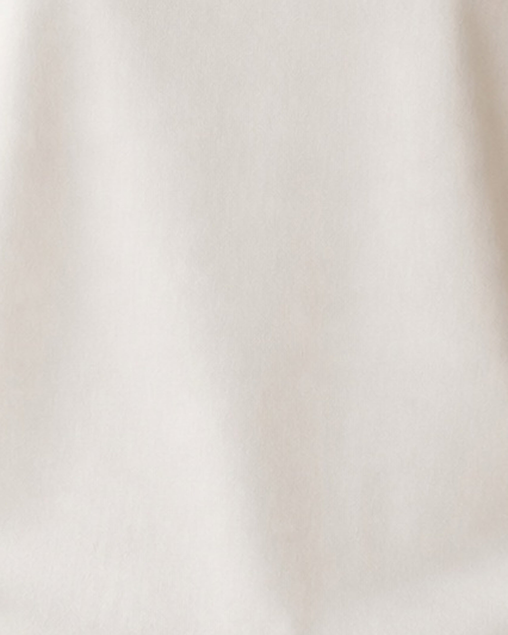The Typese ESFJ Comfort Colors Tee in cream white, female fabric detail