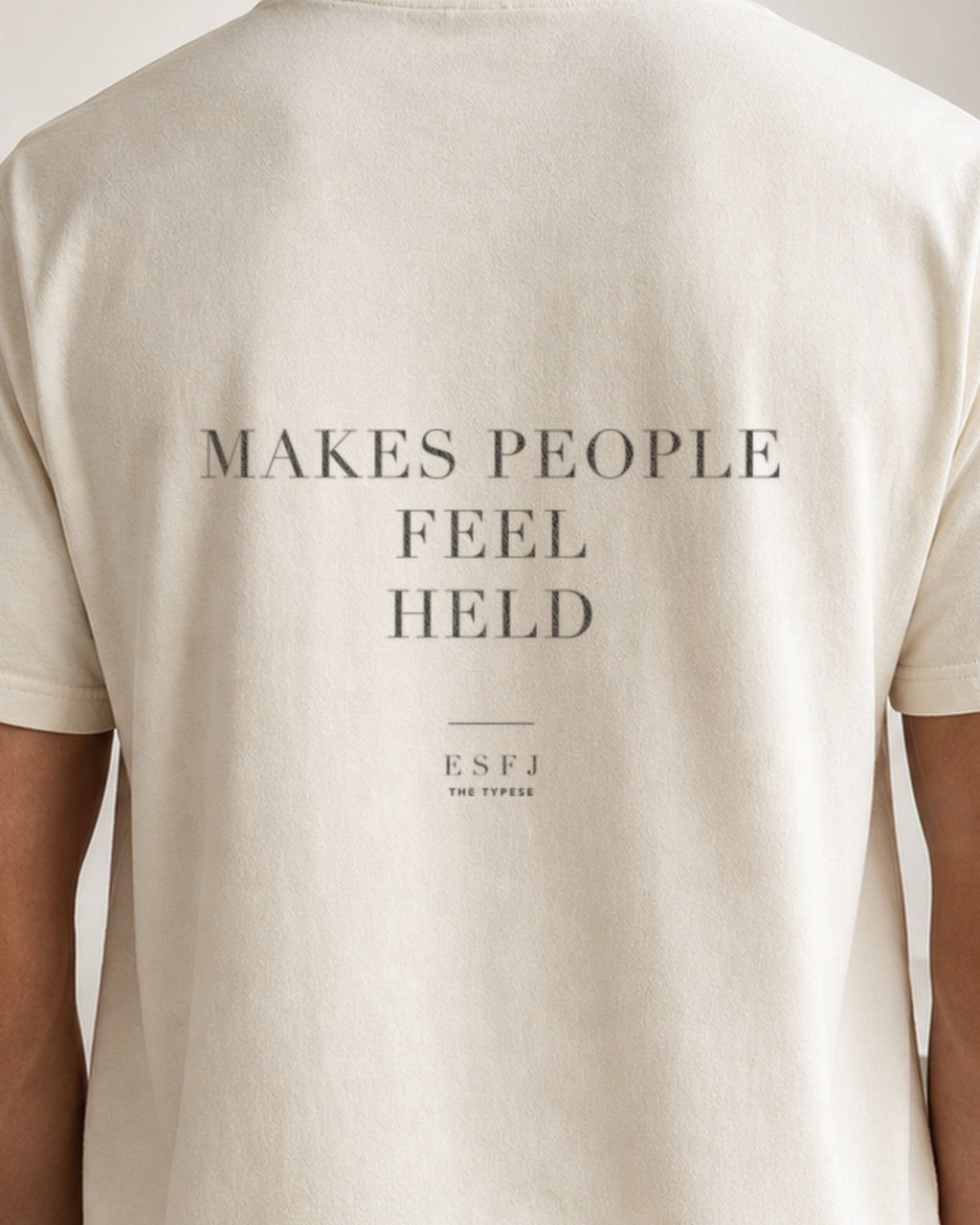 The Typese ESFJ Comfort Colors Tee in cream white, male back detail