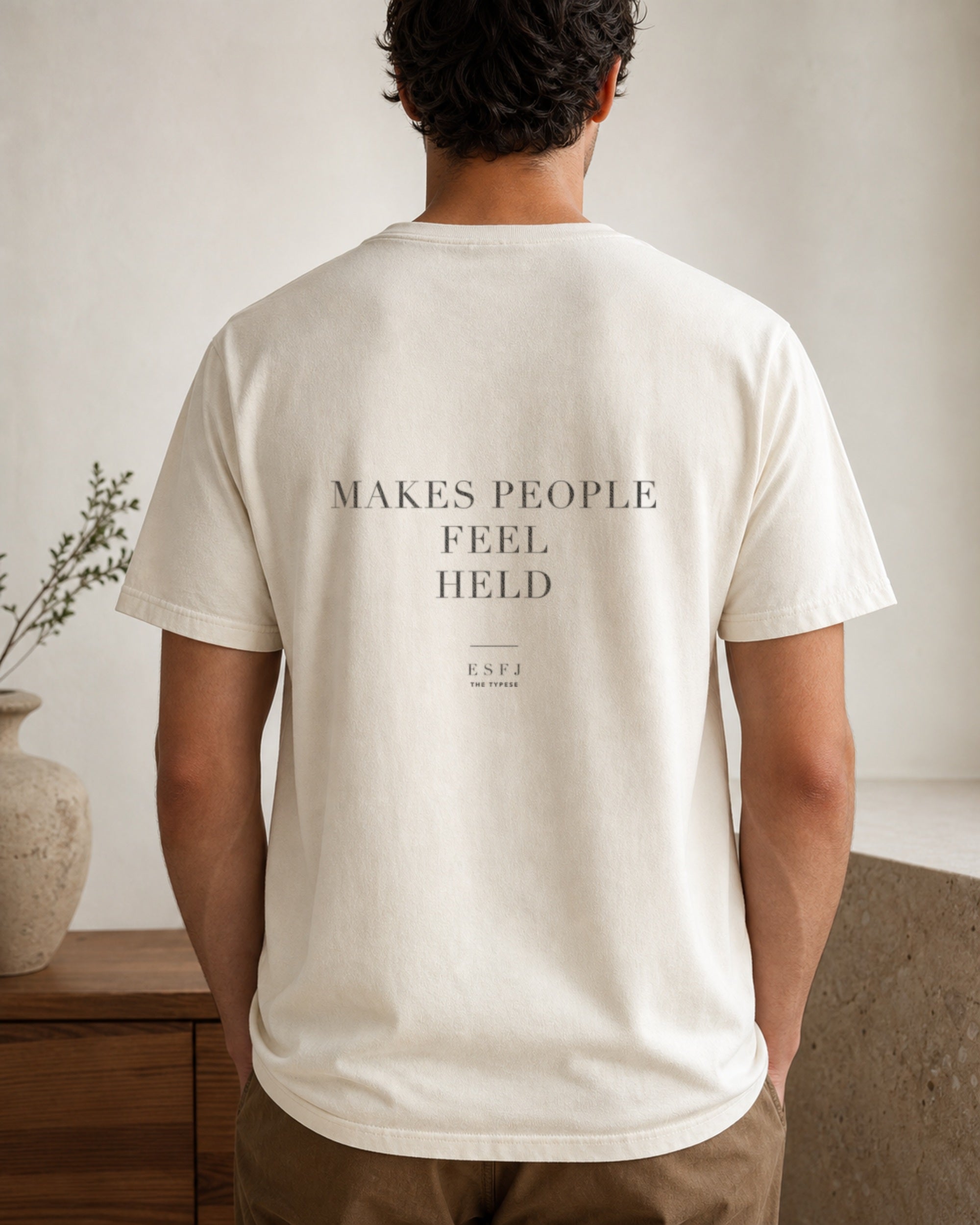 The Typese ESFJ Comfort Colors Tee in cream white, male back